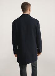 Navy blue men's coat PLAMT-0006-69(Z25), product visible from the back on the model, half of the silhouette visible.