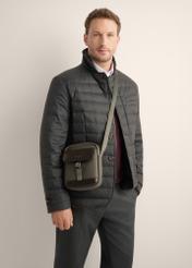 TORMN-0437-8B(Z26) men's city crossbody bag, front product view of model on white background. Half silhouette visible.