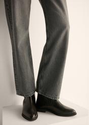 Women's black leather Chelsea boots BUTYD-1279-99(Z26), front view of the product on the model's feet.