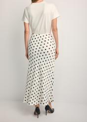 Women's white polka dot skirt SPCDT-0122-0P(W26), back view of the product on the model. Half of the silhouette visible.