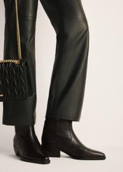 Women's leather ankle boots BUTYD-1209-99(Z25), product view on the model's feet against a light background.