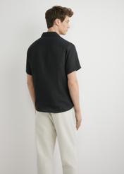 Men's black linen shirt KOSMT-0359-99(W26), back view of the product on the model. Half of the silhouette visible.