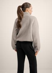 Short gray women's fur coat FUTDP-0083-9B(Z26) product view from the back on the model, half of the silhouette visible.