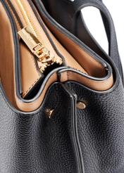 Black large women's handbag TOREC-1054-99(Z25), detail view of the product on a white background, close-up of the zipper.