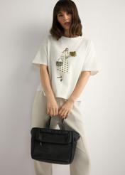 Black TOREN-0346-99(W26) lunchbox bag - view of the product held in the model's hand, against a light background. Knee-length silhouette visible.