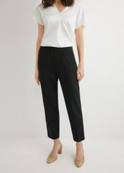 Black elegant women's trousers SPODT-0109-99(W26), front view of the product on the model. Half of the silhouette visible.