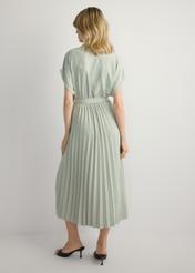 Long sage women's dress SUKDT-0274-8F(W26), back view of the product on the model. Full silhouette visible.
