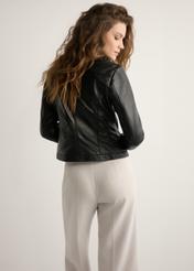 Women's black genuine leather jacket KURDS-0154-99(W26) - product view from the back, against a light background. Knee-length silhouette visible.