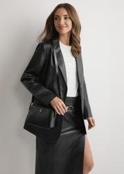 Black small women's handbag TOREC-1126-99(W26), front view of the product on a model, half of the silhouette visible.