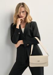 Cream women's imitation leather handbag TOREC-1081-0B(W26), product view on model's shoulder. Half of silhouette visible.