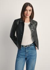 Black short women's leather jacket KURDS-0598-99(W26), product view from the front on the model, half of the silhouette visible.