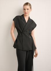 Women's black oversize suit vest KAMDT-0039-99(Z26), front view of the product on the model. Half of the silhouette visible.