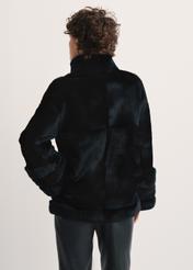 Black women's fur coat with a stand-up collar, natural FUTDF-0077-0984(Z24), back view of the product on a model, half of the silhouette visible.