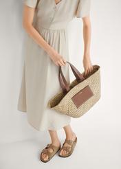 Women's leather flip-flops in cool beige color BUTYD-1158-1K(W26), front view of the product on the model's feet.