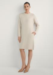 Beige women's dress SUKDT-0260-1A(W26), front view of the product on the model. Full body visible.