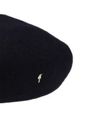 Black woolen women's beret CZADT-0234-99(Z26) - close-up of detail, on white background.