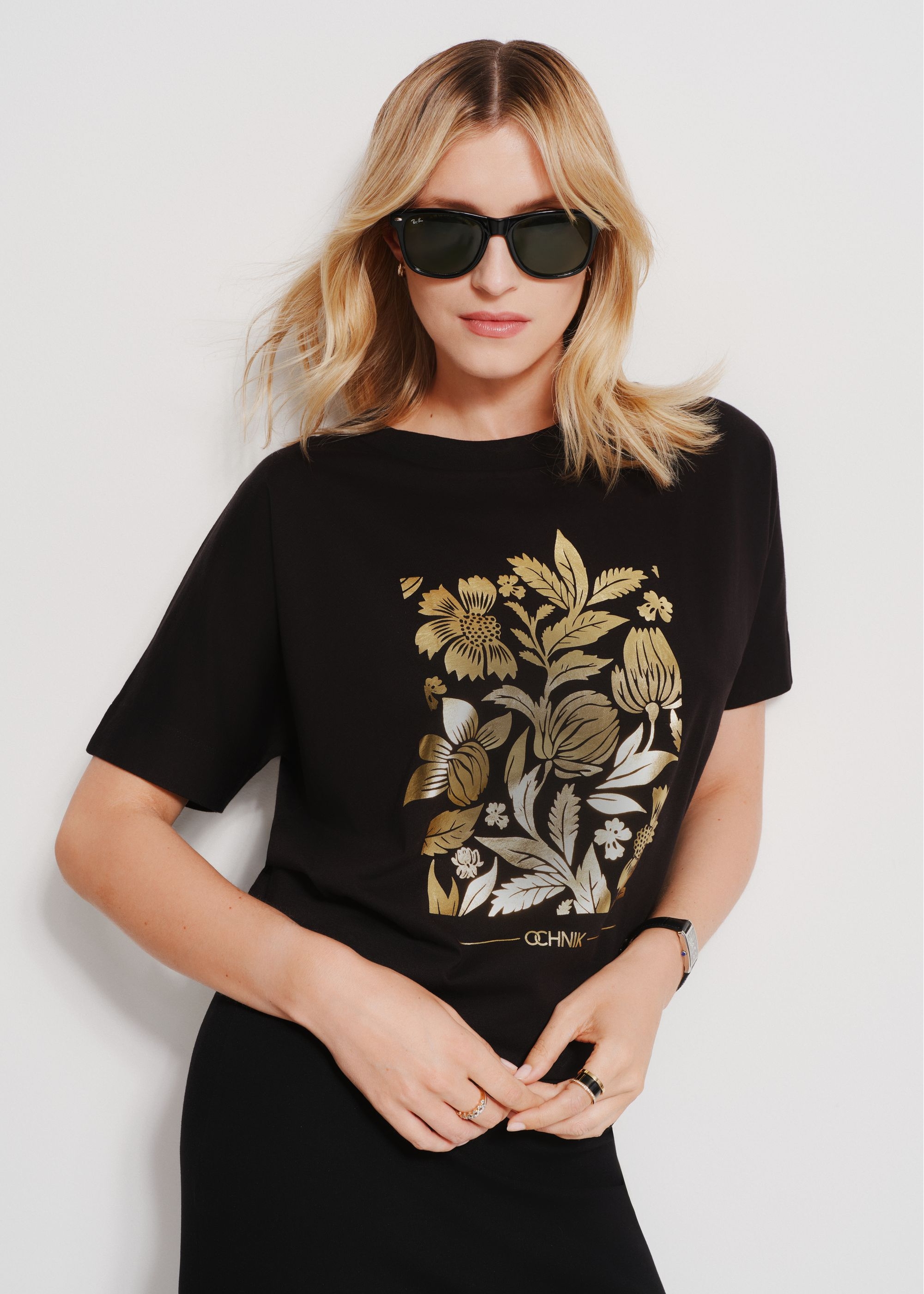 Black women's t-shirt with floral print TSHDT-0132-99(Z24)-02