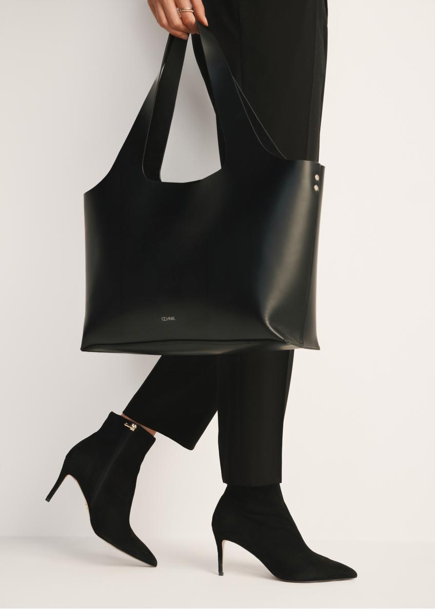 Black suede high heel ankle boots BUTYD-1122-98(Z24), product view on model's feet against a light background.