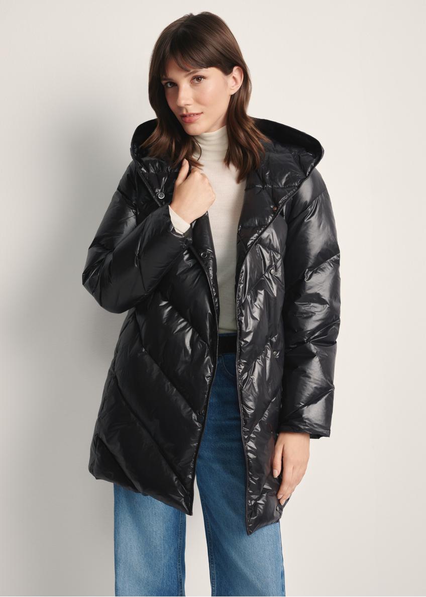 Black women's quilted jacket KURDT-0595-99(Z25), front view of the product on the model, half of the silhouette visible.