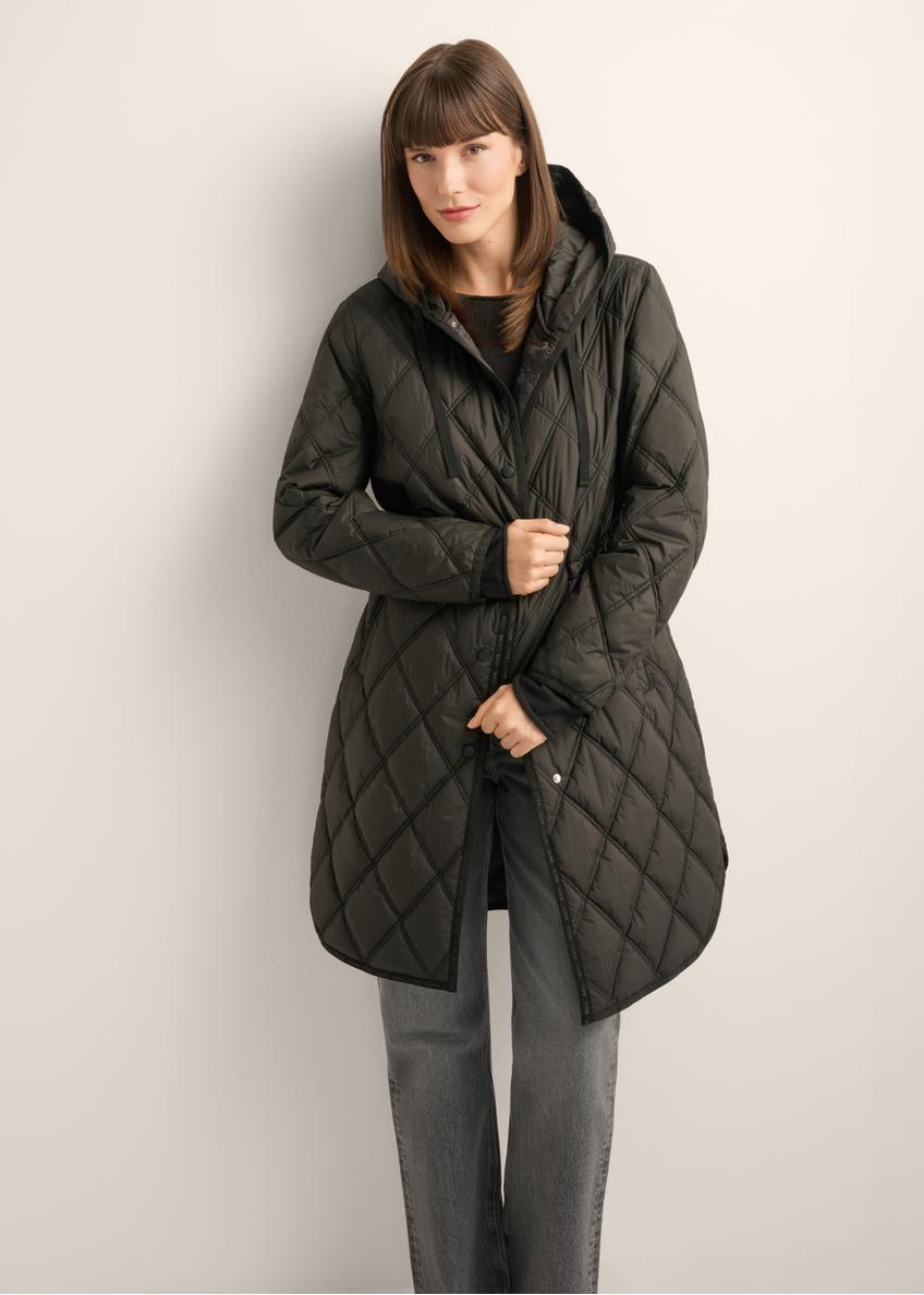 Women's black quilted jacket KURDT-0579-99(Z25), front view of the product on the model. Half of the silhouette visible.