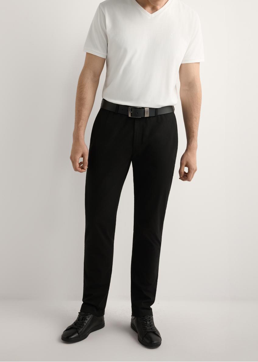 Black men's trousers SPOMT-0121-99(W26), front view of the product on the model, half of the silhouette visible.