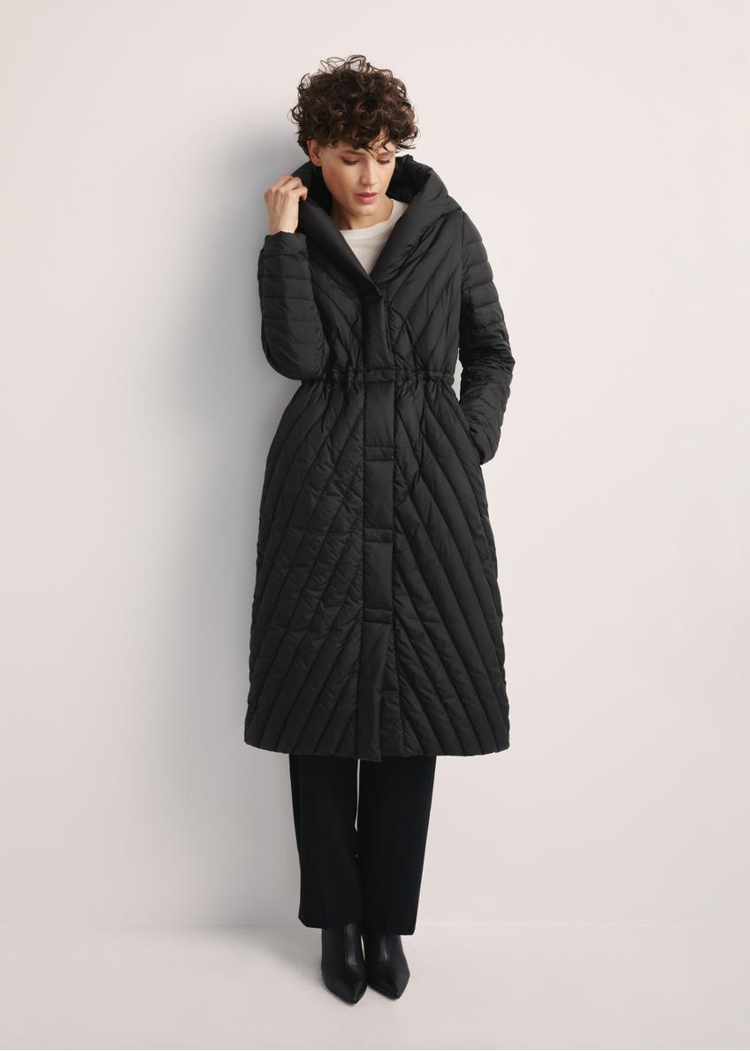 Women's long jacket with quilting KURDT-0523-98(Z25), front view of the product on the model, the entire silhouette is visible.