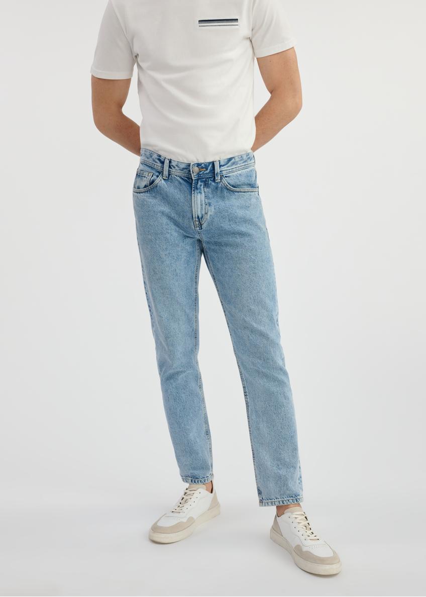 Blue men's jeans JEAMT-0024-60(W25) - front view of the product on a model on a white background. Half of the silhouette visible.