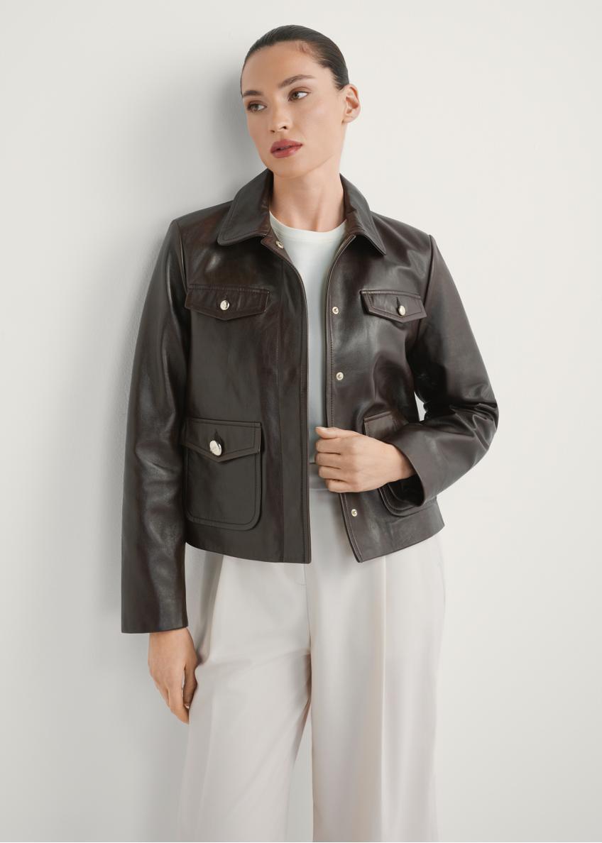 Dark brown women's leather jacket KURDS-0589-1I(W26), front view of the product on the model. Half of the silhouette visible.