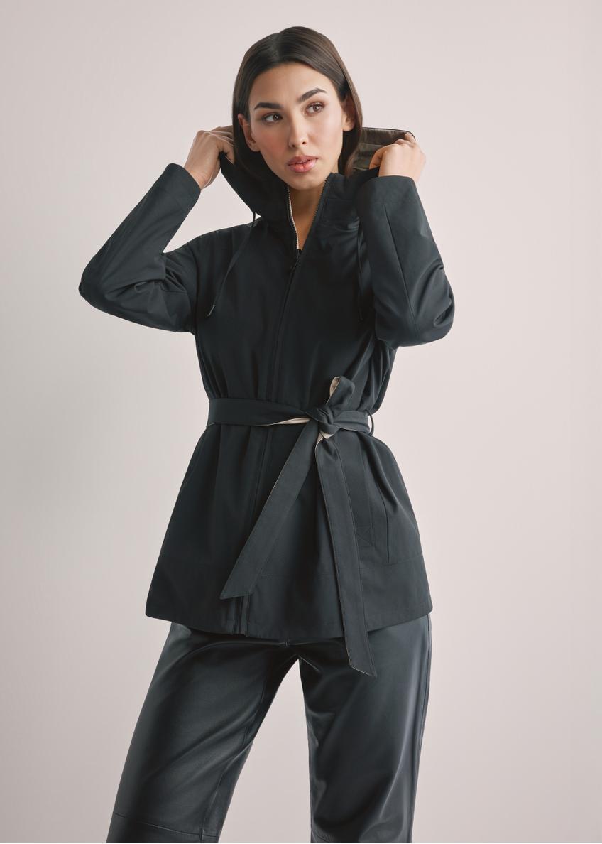 Women's reversible transitional jacket KURDT-0655-9J(W26), front view of the product on the model. Half of the silhouette visible.