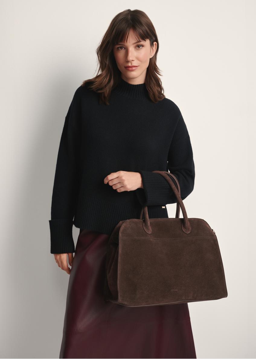 Brown suede handbag TORES-1191-89(Z25), front view of the product on a model, half of the silhouette visible.