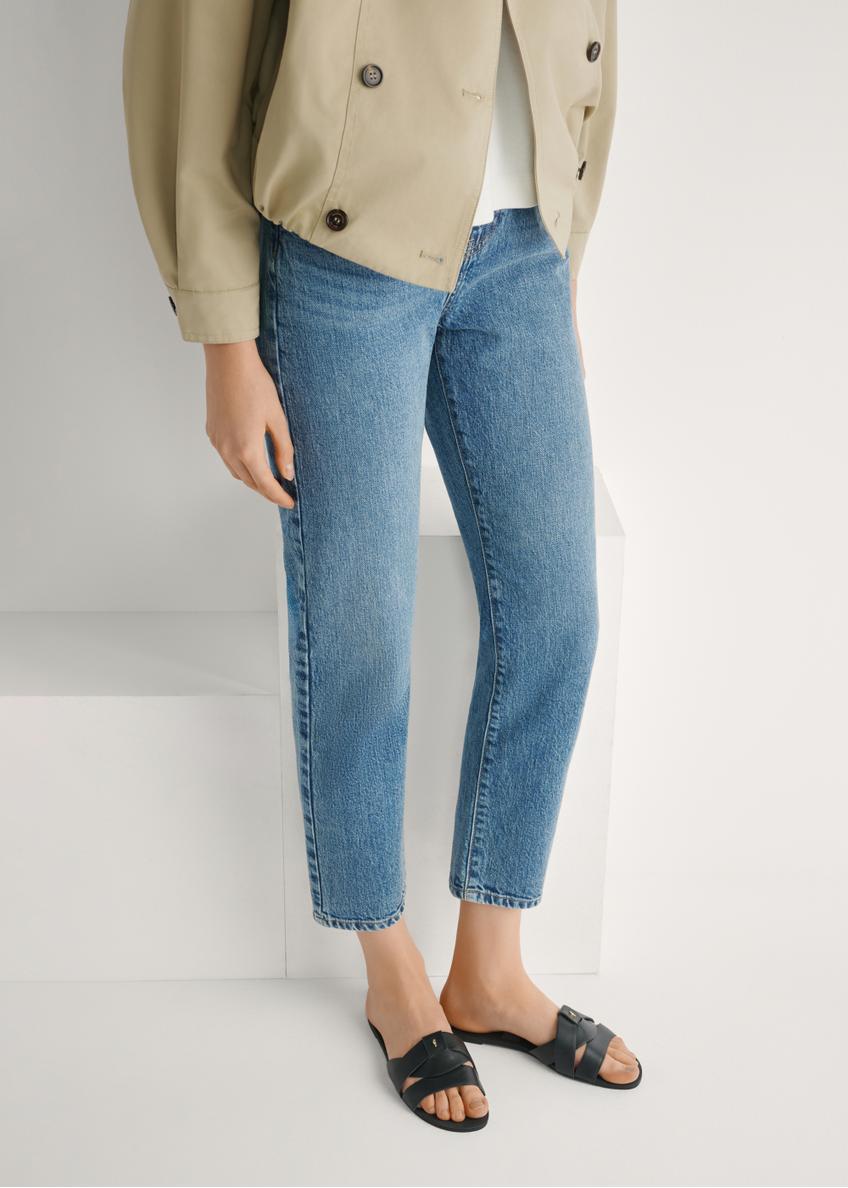 Women's black braided flip-flops BUTYD-0903C-99(W26), front view of the product on the model's feet.