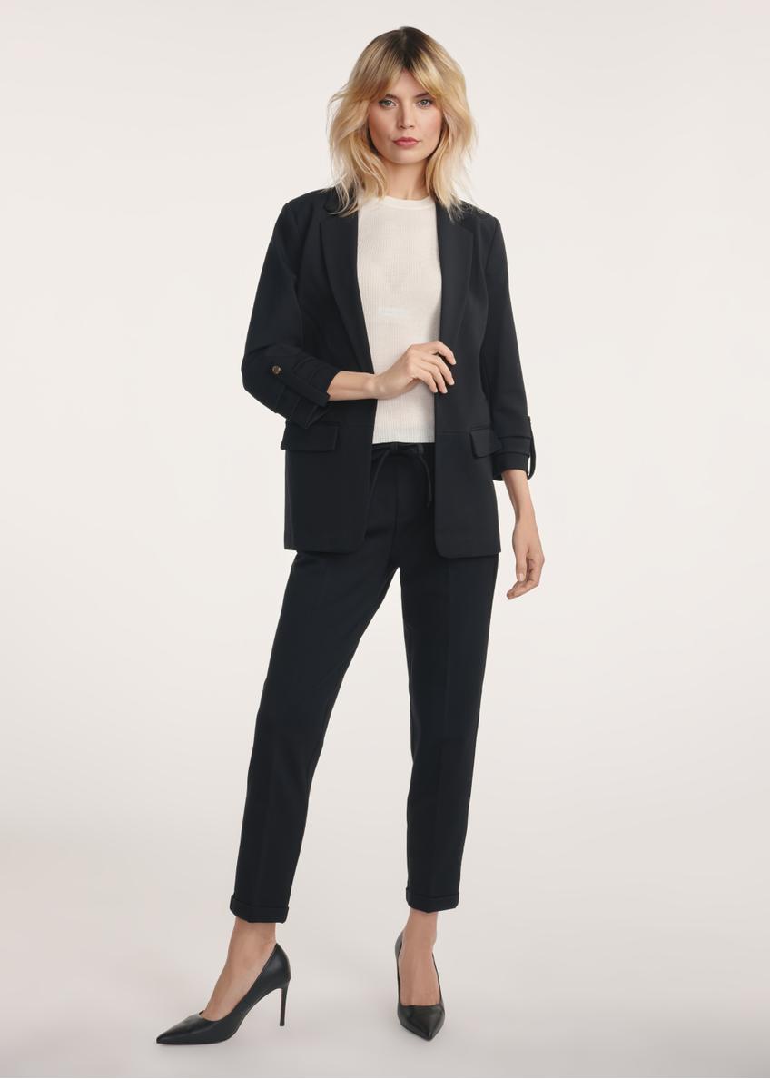 Black women's trousers with a crease SPODT-0098-99(Z24), product view from the front on the model, the entire silhouette is visible.