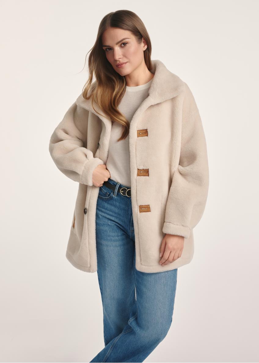 Women's double-sided sheepskin coat KOZDP-0009-24(Z24), product view from the front on the model, half of the silhouette visible.