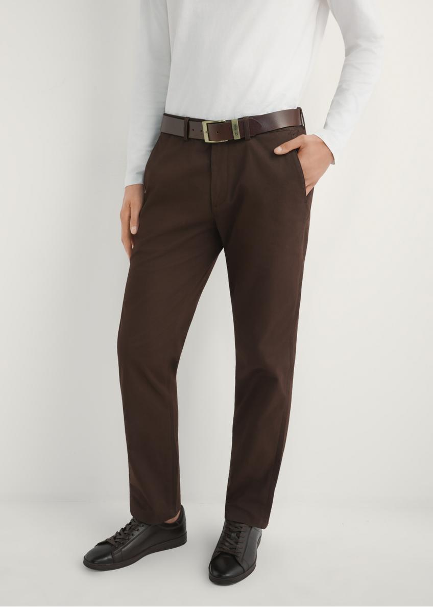 Men's brown trousers SPOMT-0121-1I(W26) - front view of the product, on a model, against a light background. Half of the silhouette visible.