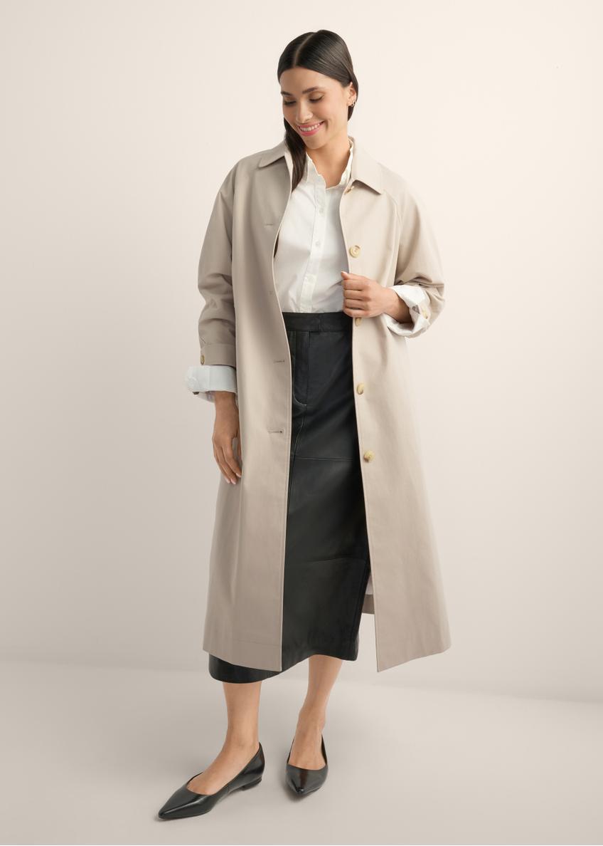 Long beige women's coat KURDT-0692-1J(Z26), product view from the front on the model, the whole silhouette is visible.