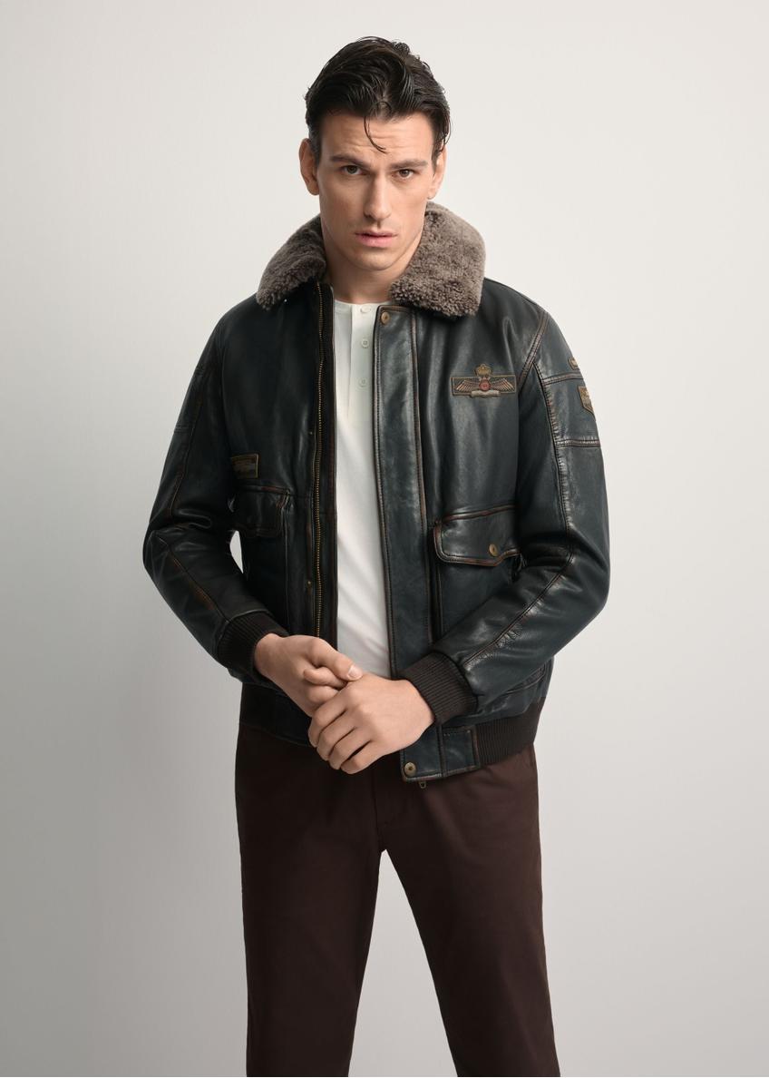 Brown leather jacket with collar KURMS-0380-1I(Z26), front view of the product on the model. Half of the silhouette visible.