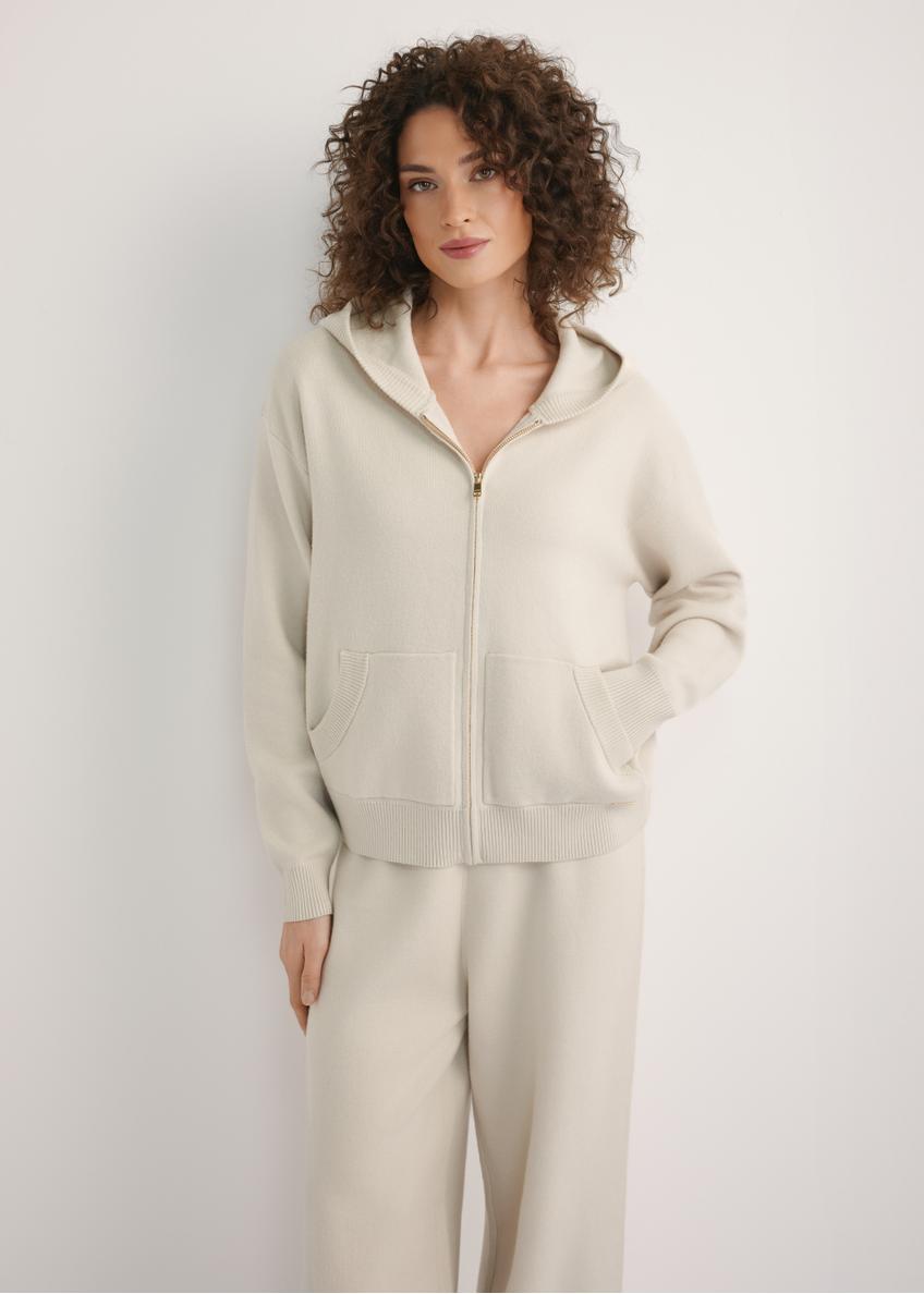 Beige women's hooded sweatshirt BLZDT-0120-1A(W26), front view of the product on the model. Half of the silhouette visible.