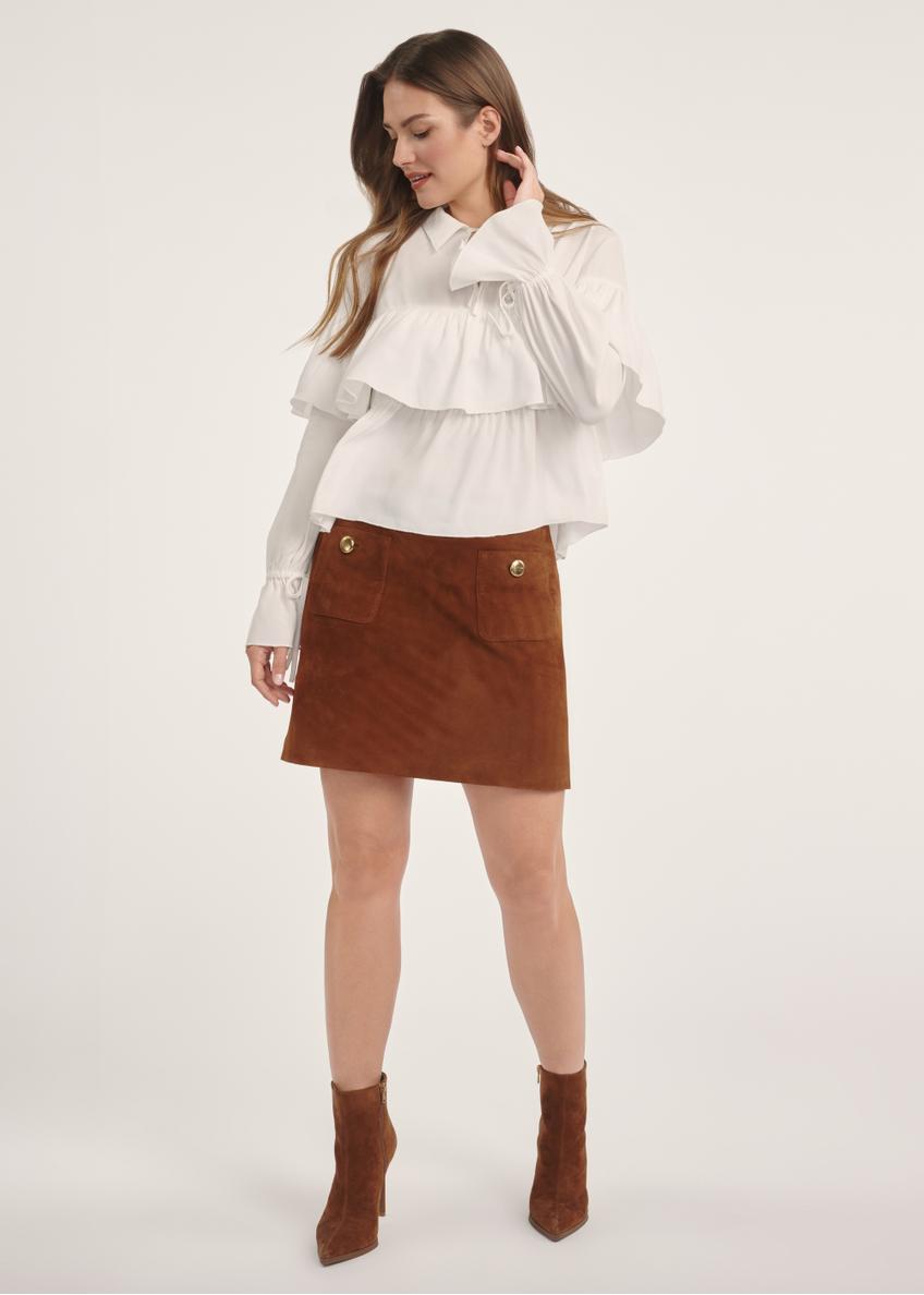 Suede mini skirt in cognac color SPCDS-0078-3205(Z25), product visible from the front on the model, the entire silhouette is visible.