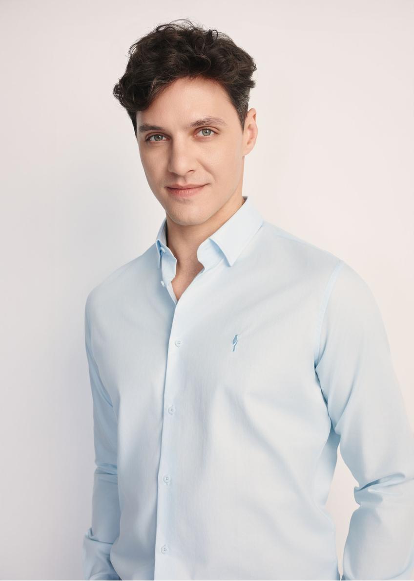 Blue men's shirt KOSMT-0351-62(Z25) - front view of the product on a model on a white background. Half of the silhouette visible.