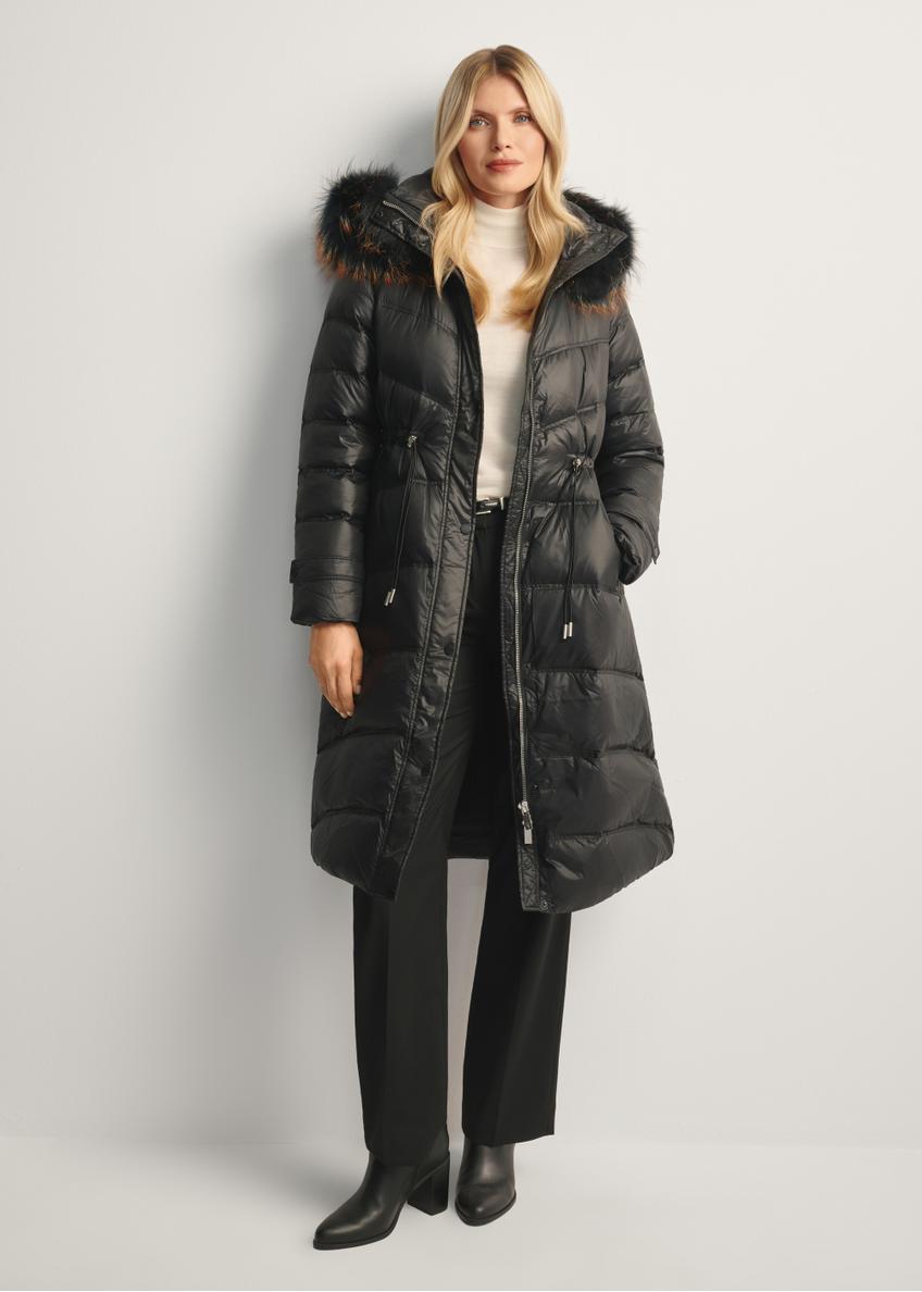 Black women's winter jacket with natural fur KURDT-0618-99(Z25), front view of the product on the model, the entire silhouette is visible.