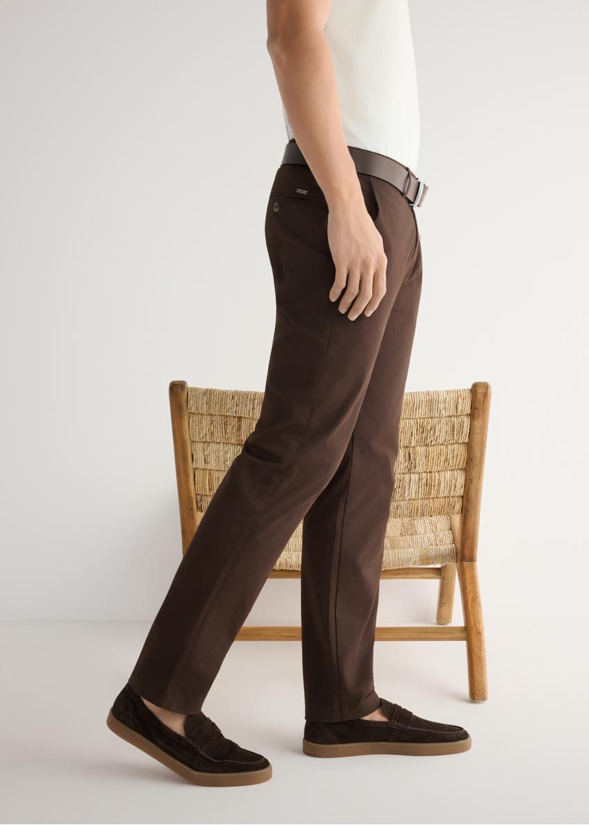 Men's brown leather moccasins BUTYM-0498-1I(W26), side view of the product on the model's feet.