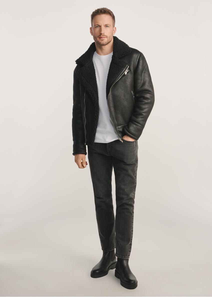Classic black men's sheepskin coat KOZMP-0001A-99(Z24), product visible from the front on the model, the entire silhouette is visible.