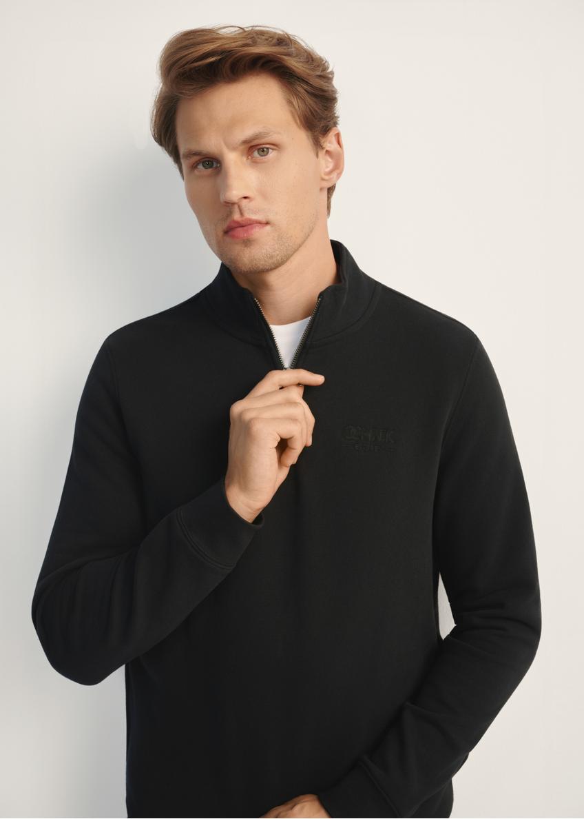 Men's black hooded sweatshirt BLZMT-0067-99(Z25), front view of the product on the model. Half of the silhouette visible.