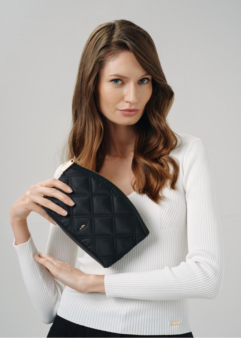 Black quilted women's cosmetic bag TOREN-0281-99(W24)