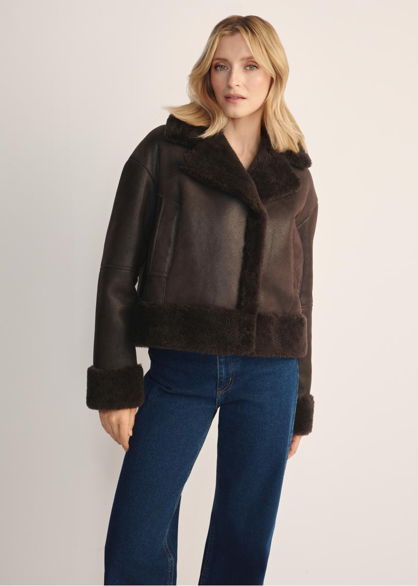 Women's brown leather sheepskin coat KOZDS-0096-3099(Z25) - front view of the product, on a model, against a white background. Knee-length silhouette visible.