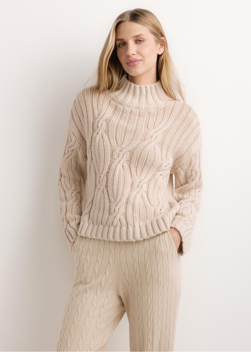 Women's oversized sweater in light beige SWEDT-0278-1A(Z26), product view from the front on the model. Half of the silhouette visible.