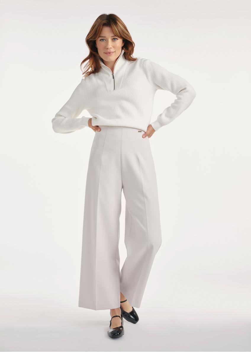 Light beige women's wide trousers SPODT-0118-80(Z25), front view of the product on the model, the entire silhouette is visible.