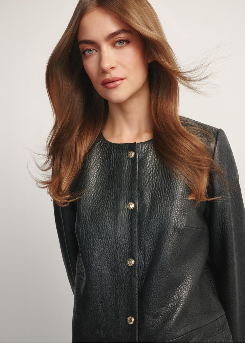 Black women's leather jacket KURDS-0583-99(W26), close-up of the product detail on the model's silhouette.