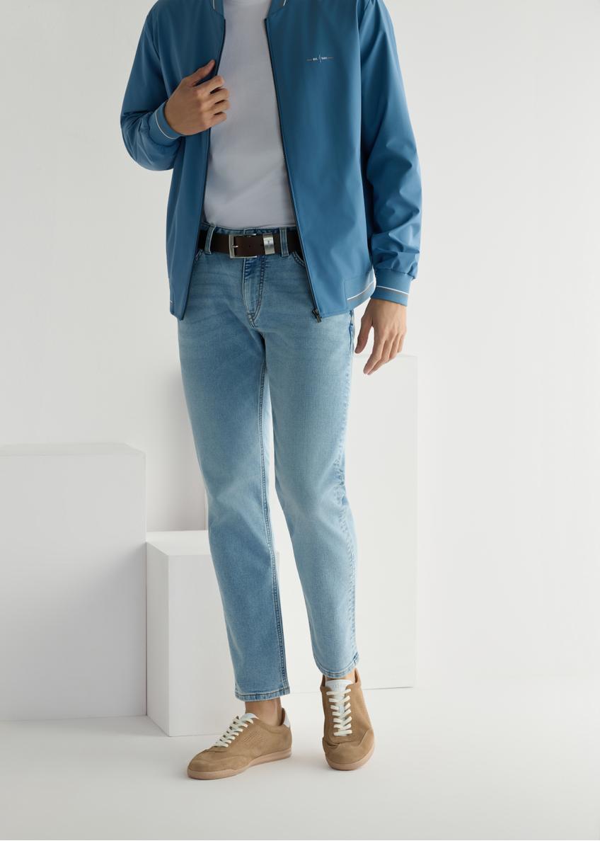 Beige leather sports shoes BUTYM-0534-1B(W26), front product view on model's feet, on light background.