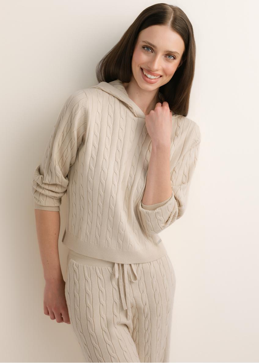 Beige women's hooded sweater BLZDT-0124-1A(Z26), front view on a model. Half-body shot.